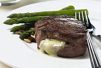 Brie-Filled Australian Beef Tenderloin with Horseradish Cream and Asparagus