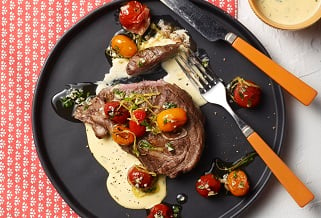Grilled Aussie lamb shoulder chops with blistered cherry tomatoes and bearnaise
