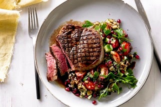 Griiled Aussie Beef Ribeye Steaks with Smoky Eggplant and Pomegranate Salad