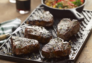 Lamb T-bones with beer and bean ragout