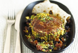 Slow-cooked ribeye with tomatillo salsa and pintos with warm tortillas