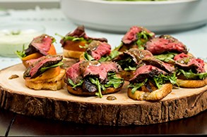 Mustard Glazed Beef Tenderloin with Peach and Arugula Bruschetta