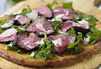 Australian Beef Arugula and Parmesan Pizza with Mint Oil