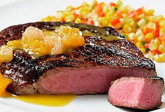 Citrus-Soy Australian Beef Ribeye Steak with Corn and Pepper Medley