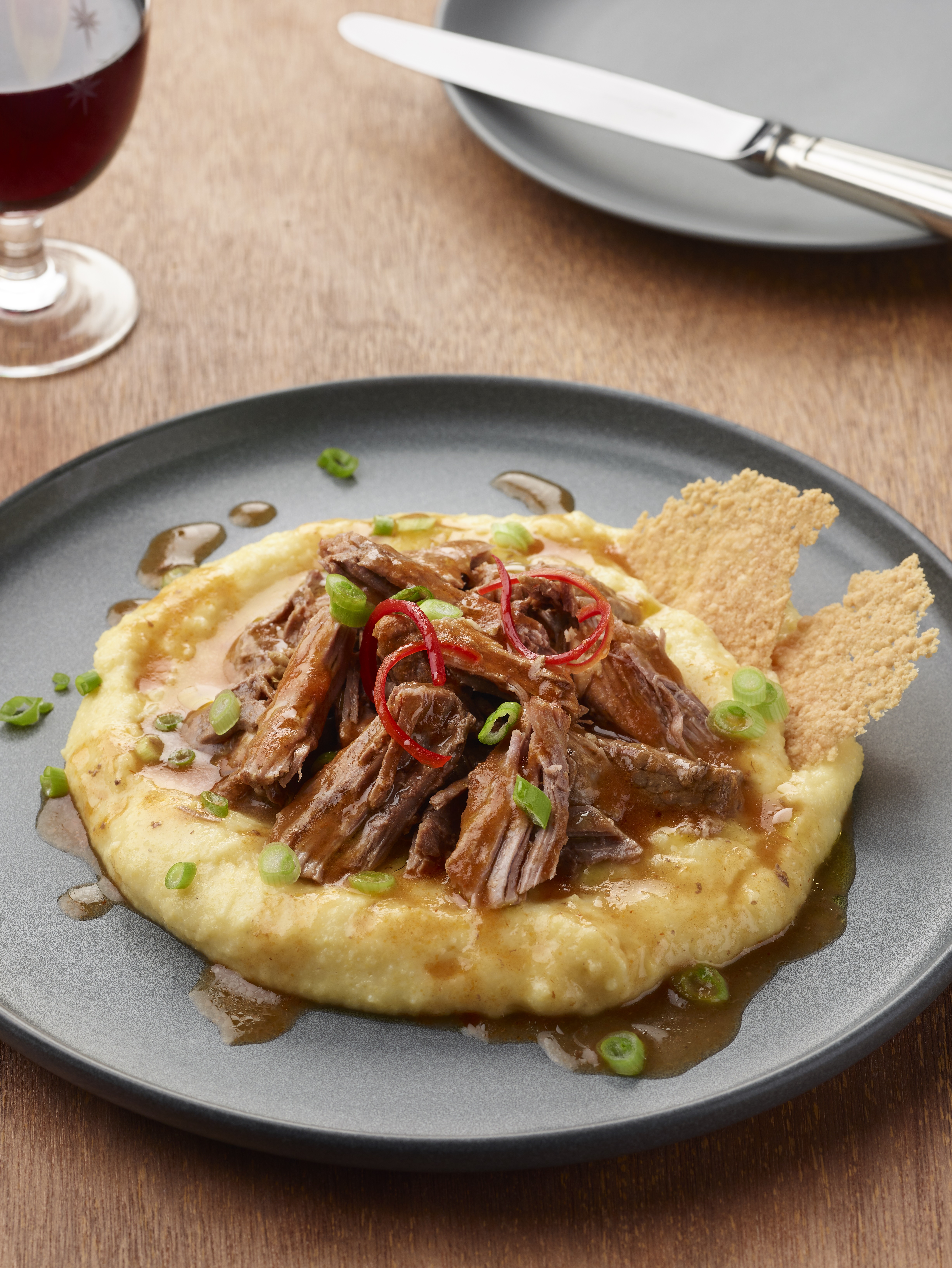 Easy Instant Pot Parmesan braised Australian boneless lamb leg on polenta