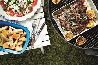 Greek-style butterflied Aussie leg of lamb with roasted vegetables and grilled lemon